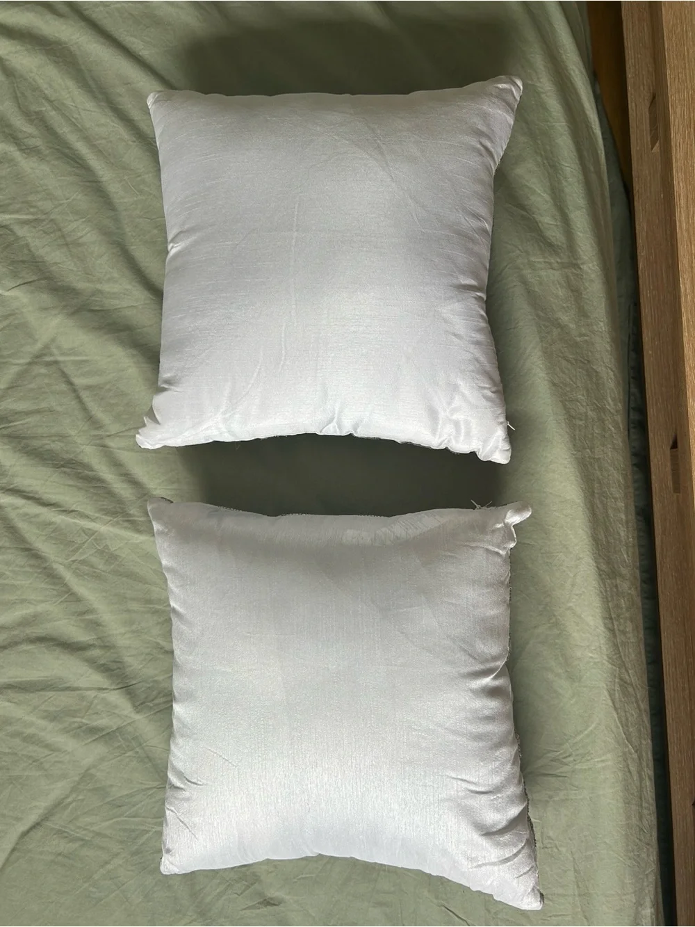 White Decorative Throw Pillow Pair with Beaded Silver Pattern